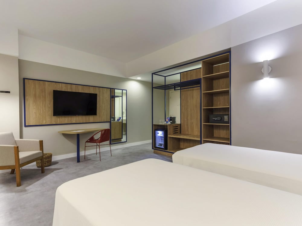 Habitación superior con 2 camas individuales del hotel Novotel Salvador Rio Vermelho. Foto 1