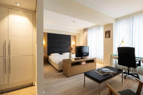 Habitación Doble Estándar del hotel B-Aparthotels Grand Place. Foto 1