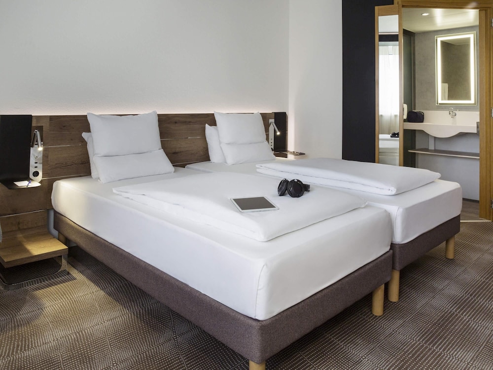 Habitación superior con 2 camas individuales del hotel Novotel Lausanne Bussigny