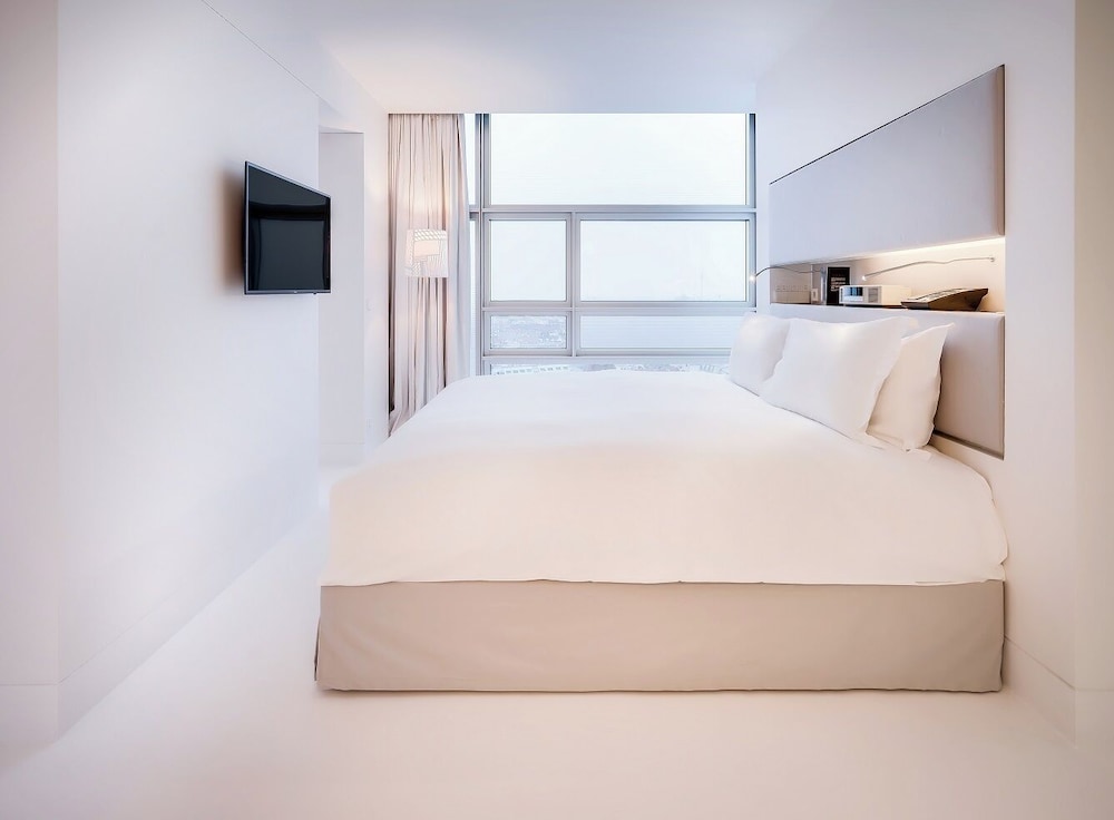 Suite junior - Vistas a la noria, cama king del hotel So/ Vienna