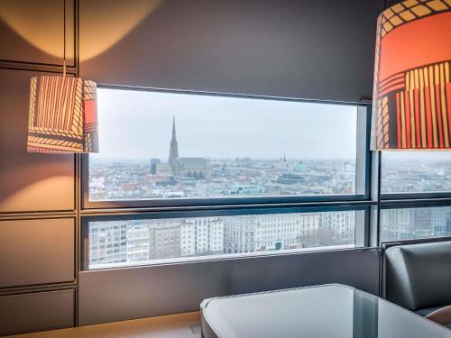 Suite ejecutiva - Vistas a la catedral, cama king del hotel So/ Vienna. Foto 7