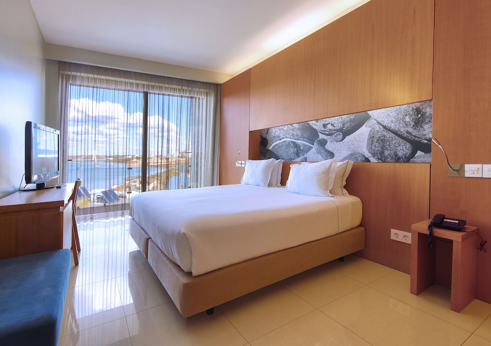 Habitación superior con 1 cama doble o 2 individuales (2) del hotel Agua Hotels Riverside. Foto 2