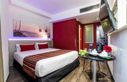 Habitación Doble Confort - 1 o 2 camas del hotel Leonardo Boutique Barcelona Sagrada Familia. Foto 1