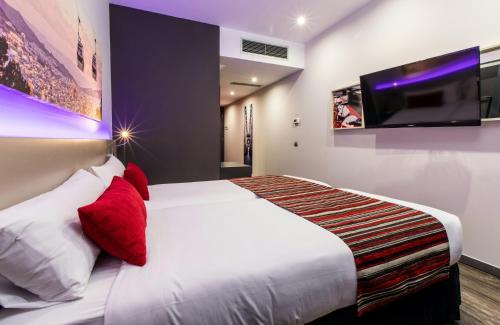 Habitación Doble Confort - 1 o 2 camas del hotel Leonardo Boutique Barcelona Sagrada Familia. Foto 7
