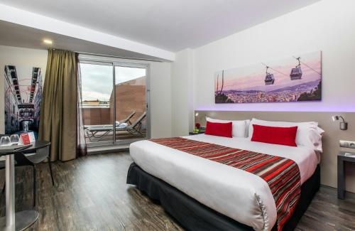 Habitación Doble Deluxe del hotel Leonardo Boutique Barcelona Sagrada Familia. Foto 2