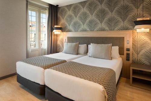 Habitación Doble con vistas - 2 camas del hotel Catalonia Atocha. Foto 3