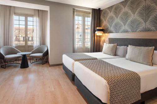 Habitación Doble con vistas - 2 camas del hotel Catalonia Atocha. Foto 4