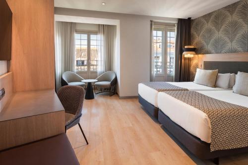 Habitación Doble con vistas - 2 camas del hotel Catalonia Atocha. Foto 6