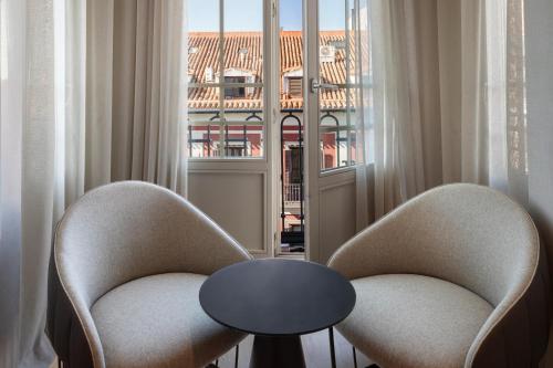 Habitación Doble con vistas - 2 camas del hotel Catalonia Atocha. Foto 7