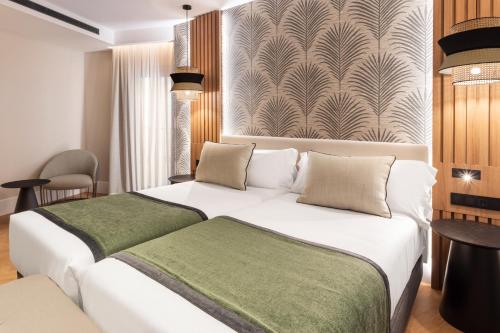 Habitación Deluxe del hotel Catalonia Atocha. Foto 3