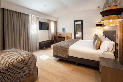 Habitación Triple del hotel Catalonia Atocha. Foto 4