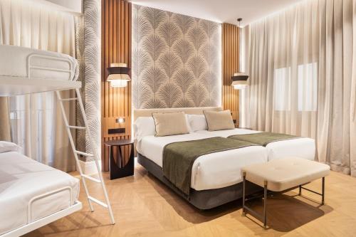 Habitación Familiar Deluxe del hotel Catalonia Atocha. Foto 3