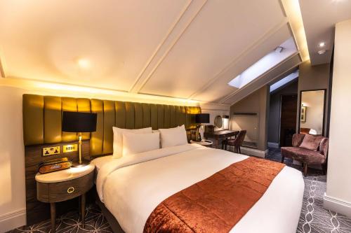 Suite Dúplex con Cama King del hotel 100 Queen's Gate London, Curio Collection By Hilton. Foto 8