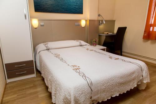 Habitación Doble con baño privado - 1 o 2 camas del hotel Barcelona. Foto 21