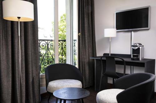 Habitación Familiar Deluxe del hotel Elysees Regencia. Foto 8