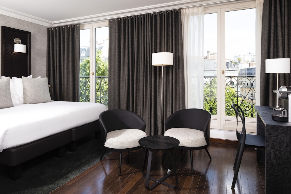 Habitación Familiar Deluxe del hotel Elysees Regencia. Foto 1