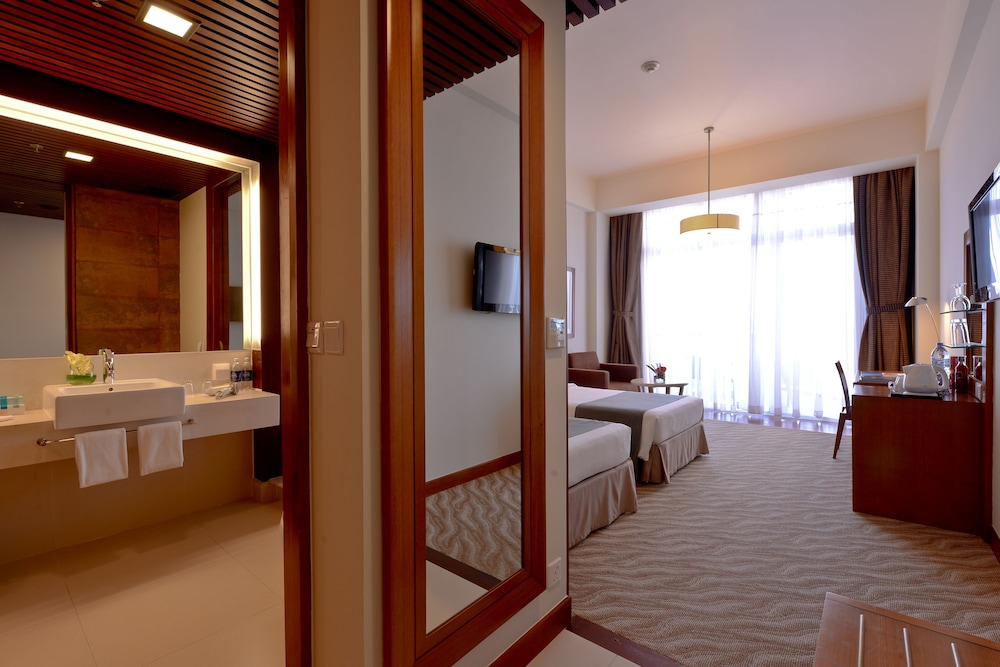 Habitación estándar con 2 camas individuales del hotel Novotel Nha Trang. Foto 1