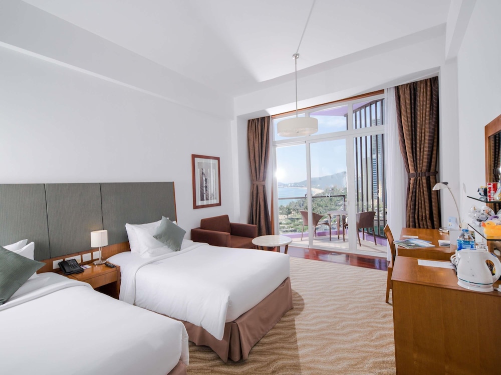 Habitación estándar con 2 camas individuales del hotel Novotel Nha Trang. Foto 7