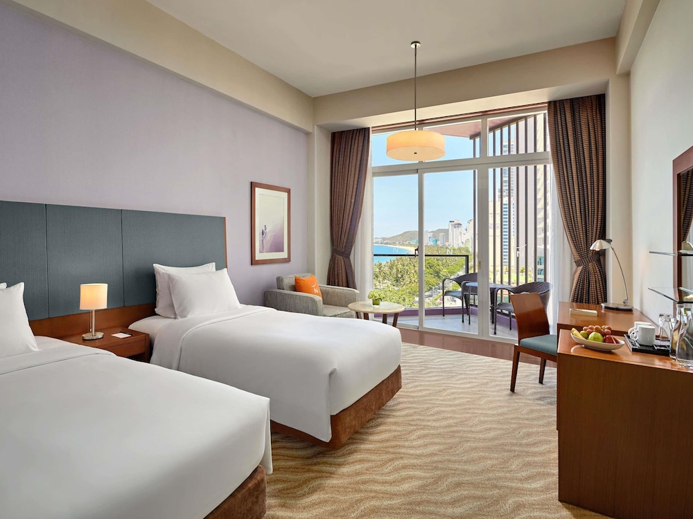 Habitación estándar con 2 camas individuales del hotel Novotel Nha Trang. Foto 12