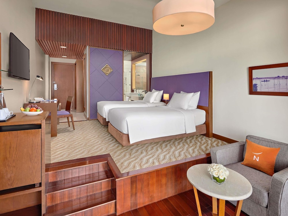 Habitación Superior con 2 camas individuales y vistas al mar del hotel Novotel Nha Trang. Foto 11