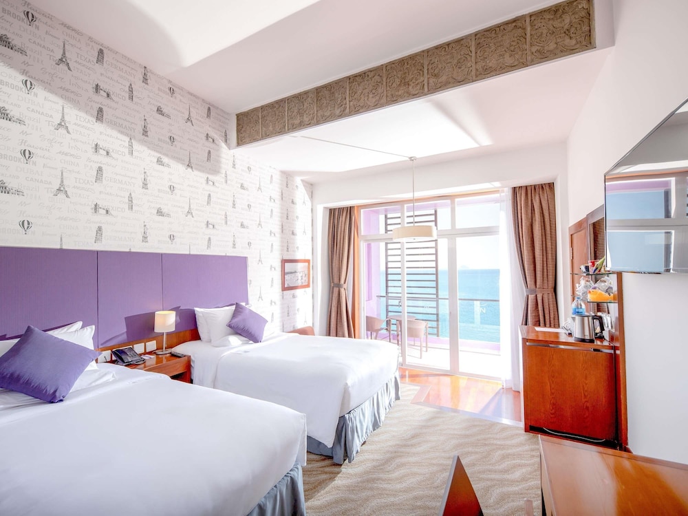 Habitación Superior con 2 camas individuales y vistas al mar del hotel Novotel Nha Trang. Foto 18