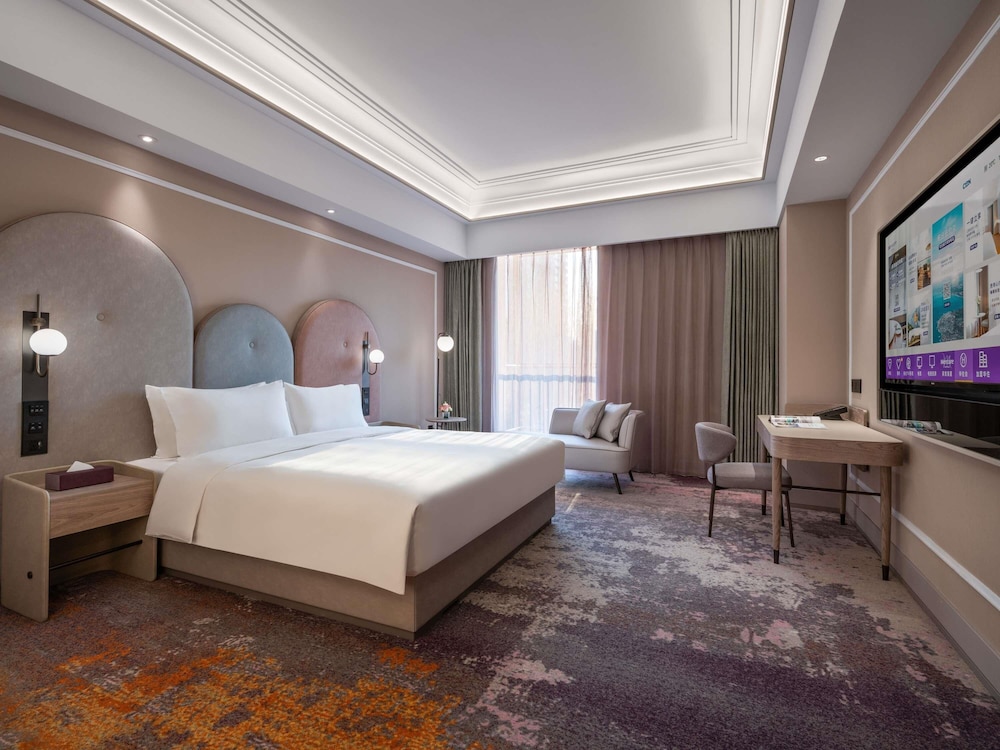 Habitación Estándar con una Cama King Size del hotel Mercure Beijing Downtown. Foto 2