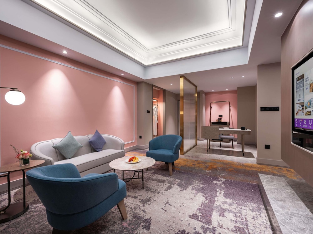 SUITE JUNIOR con 1 cama king size del hotel Mercure Beijing Downtown. Foto 4