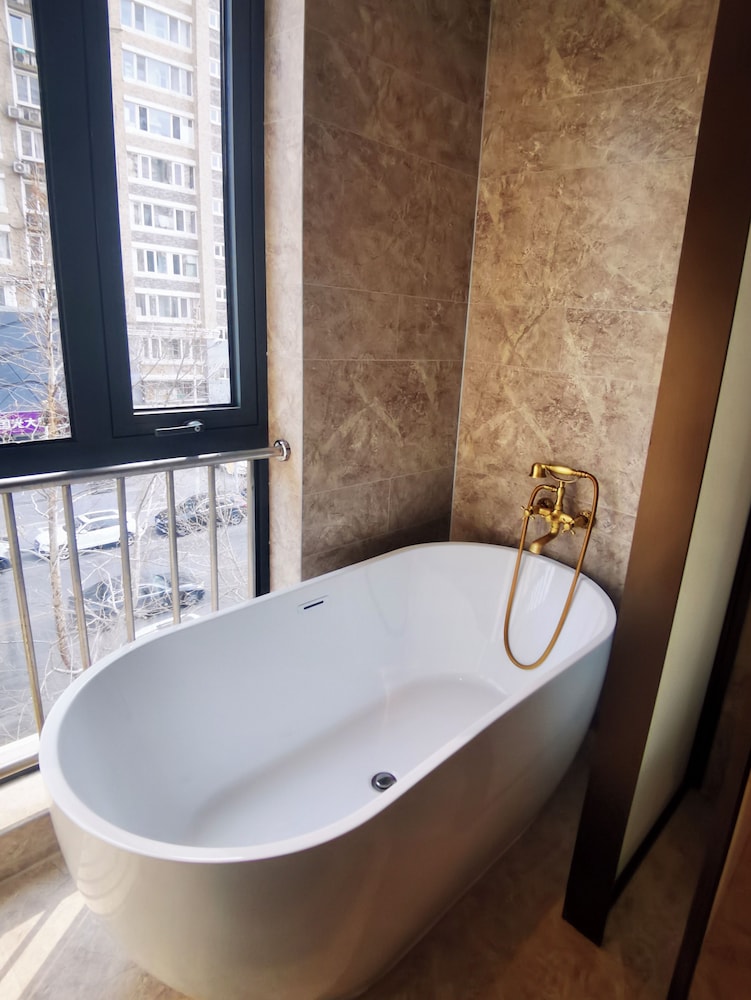 SUITE JUNIOR con 1 cama king size del hotel Mercure Beijing Downtown. Foto 5