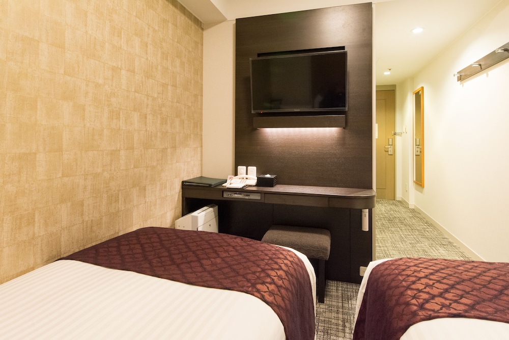 Habitación con 2 camas individuales del hotel Toshi Center Tokyo. Foto 1