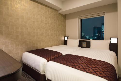 Habitación Doble Pequeña - No fumadores - 2 camas del hotel Toshi Center Tokyo. Foto 4