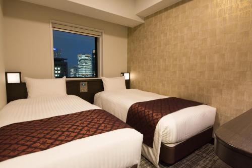 Habitación Doble Pequeña - No fumadores - 2 camas del hotel Toshi Center Tokyo. Foto 6