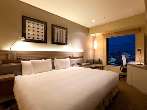 Habitación Estándar - Cama extragrande del hotel The Royal Park Iconic Tokyo Shiodome