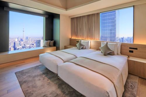 Suite Doble 38F con acceso al salón - 2 camas - Planta executive del hotel The Royal Park Iconic Tokyo Shiodome