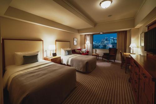 Habitación Doble Deluxe con vistas al parque - 2 camas del hotel Imperial , Tokyo. Foto 1