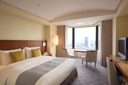 Habitación Doble Estándar - Planta superior del Edificio Torre El día 2 de enero, se espera que los restaurantes estén concurridos, y la disponibilidad estará sujeta a la capacidad. El check - in en el hotel se puede hacer a partir de las 15:00. del hotel Imperial , Tokyo