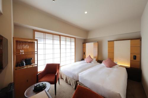 Habitación Doble Hollywood para no fumadores - 2 camas del hotel Niwa Tokyo. Foto 1
