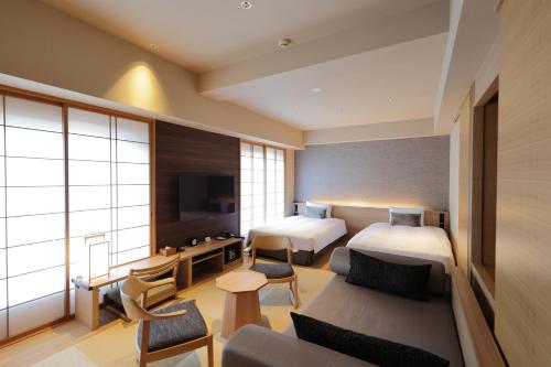 Habitación Doble Signature - 2 camas - No fumadores del hotel Niwa Tokyo. Foto 2