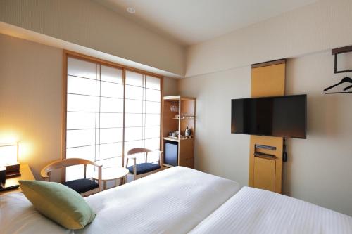 Habitación Doble Estándar (planta alta) - No fumadores - 2 camas del hotel Niwa Tokyo. Foto 2