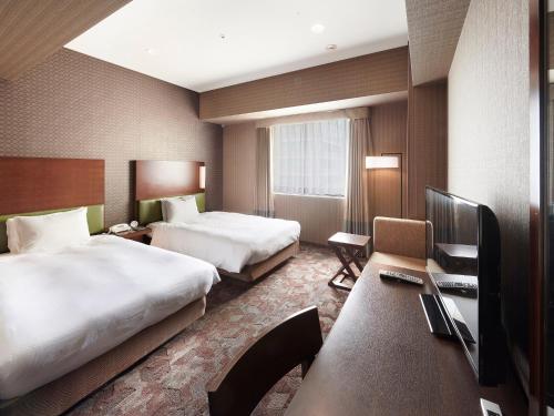 Habitación Doble - Fumadores - 2 camas del hotel Sotetsu Grand Fresa Tokyo-Bay Ariake. Foto 2