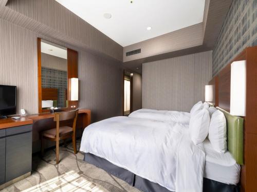 Habitación Doble Económica para no fumadores - 2 camas del hotel Sotetsu Grand Fresa Tokyo-Bay Ariake. Foto 1