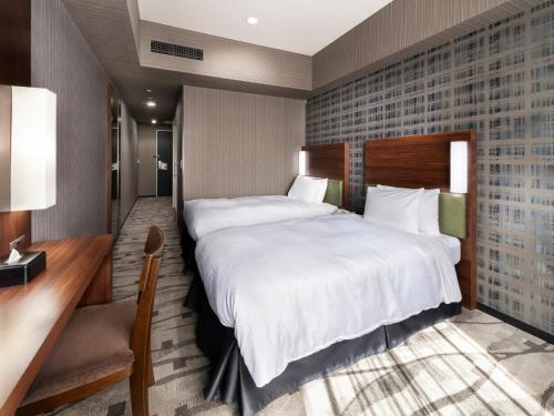 Habitación Doble Económica para no fumadores - 2 camas del hotel Sotetsu Grand Fresa Tokyo-Bay Ariake. Foto 2