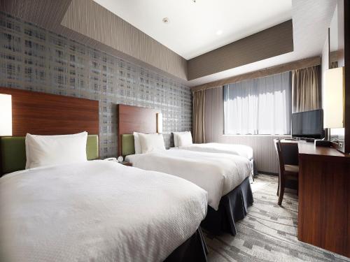 Habitación Doble Económica para no fumadores - 2 camas del hotel Sotetsu Grand Fresa Tokyo-Bay Ariake. Foto 3
