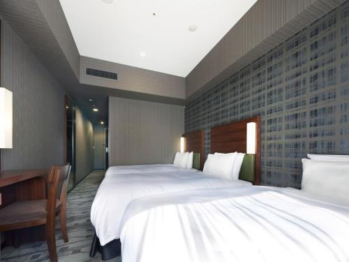 Habitación Doble Económica para no fumadores - 2 camas del hotel Sotetsu Grand Fresa Tokyo-Bay Ariake. Foto 4
