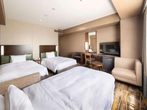 Habitación Doble Deluxe para no fumadores - 2 camas individuales del hotel Sotetsu Grand Fresa Tokyo-Bay Ariake. Foto 2
