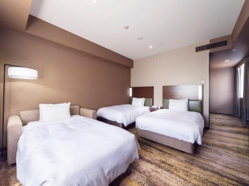 Habitación Doble Deluxe para no fumadores - 2 camas individuales del hotel Sotetsu Grand Fresa Tokyo-Bay Ariake. Foto 3