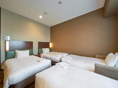 Habitación Doble Deluxe para no fumadores - 2 camas individuales del hotel Sotetsu Grand Fresa Tokyo-Bay Ariake. Foto 4