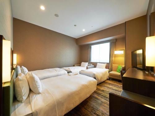 Habitación Doble Deluxe para no fumadores - 2 camas individuales del hotel Sotetsu Grand Fresa Tokyo-Bay Ariake. Foto 5