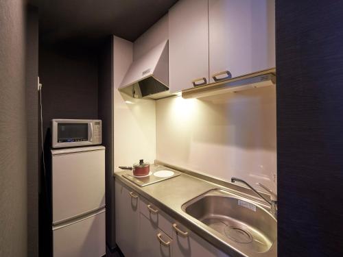 Suite Executive - No fumadores del hotel Sotetsu Grand Fresa Tokyo-Bay Ariake. Foto 1