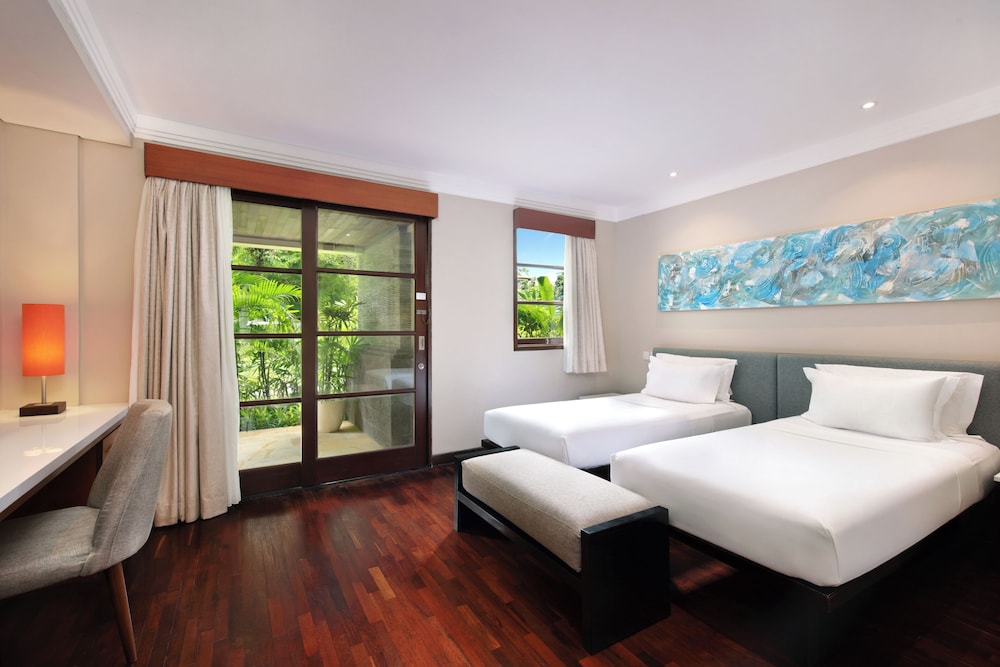 Suite Apartamento de 3 Dormitorios, 1 Cama King y 4 Camas Individuales, con Terraza Privada del hotel Novotel Bali Nusa Dua Hotel & Residence. Foto 3