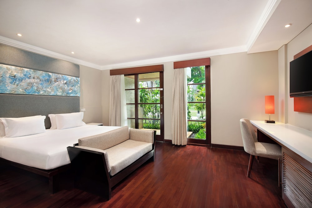 Suite Apartamento de 3 Dormitorios, 1 Cama King y 4 Camas Individuales, con Terraza Privada del hotel Novotel Bali Nusa Dua Hotel & Residence. Foto 4